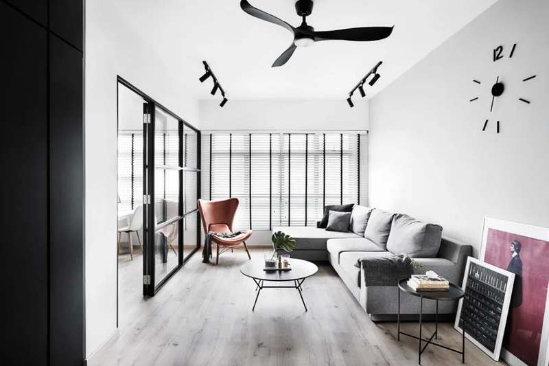 Sala de estar com decoração minimalista e industrial